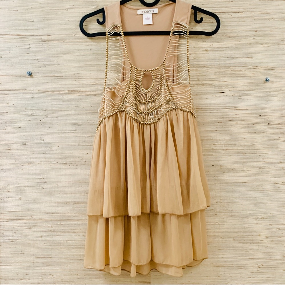 Small Tan with Gold studs blouse.